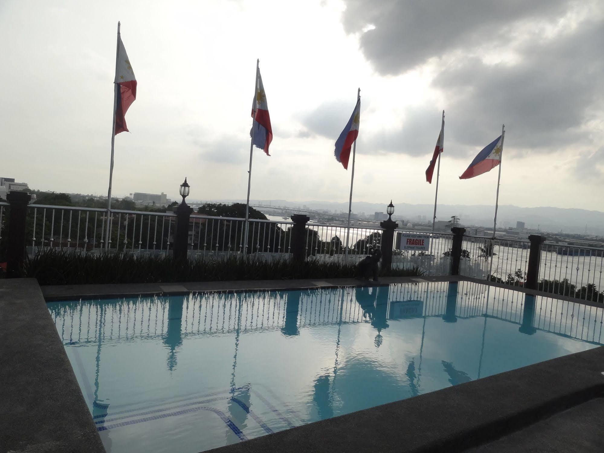 Hotel Cesario Мактан Экстерьер фото